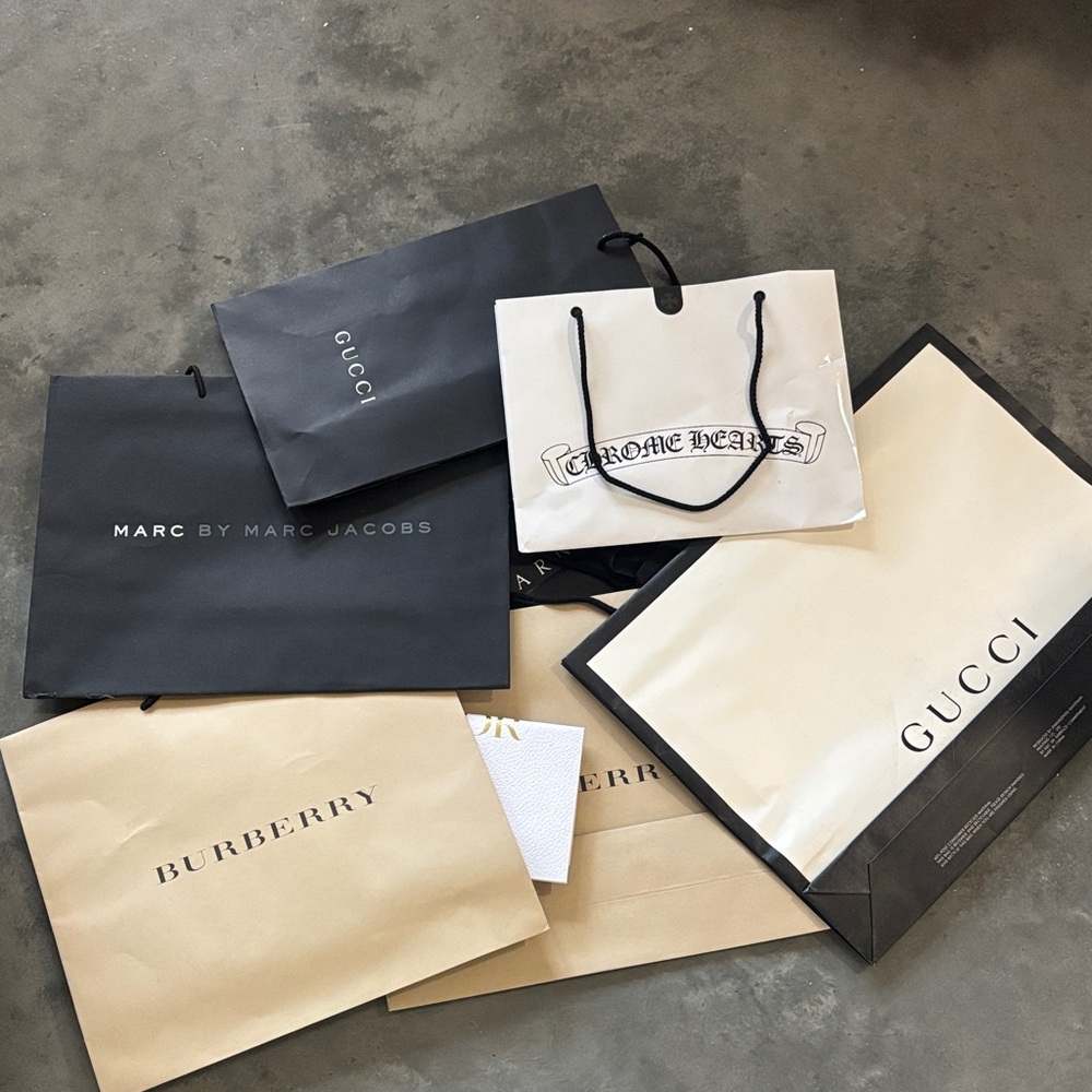 Lot of designer shopping bags used chrome hearts  Burberry Gucci Dior  Barney’s